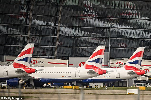 British Airways passengers forced to wait on tarmac for THREE HOURS after ‘brainless’ staff activate emergency slide