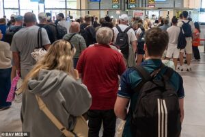 British tourists face massive airport queues as they fly home from Ibiza as new EU digital border system fails