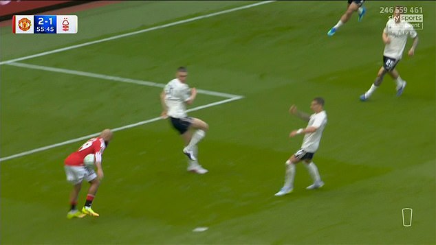 Gary Neville tells referee Michael Salisbury he’s had an ‘absolute SHOCKER’ as official refuses to overturn on-field decision after VAR recommended Man United’s goal be disallowed for handball