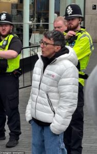 Moment Swatch worker confronts angry crowd desperate for new £335 watch and tells them to go home as ‘I have no more to sell’ – as brawls, stampedes and chaotic scenes unfold at stores of luxury Swiss brand