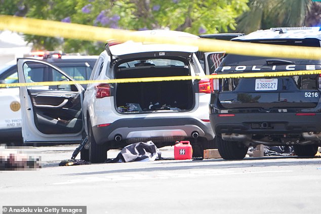 Teen high school wrestler mosque gunman revealed alongside ‘Nazi’ logo on their deadly arsenal used to kill three