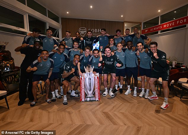 Arsenal win the Premier League title! Mikel Arteta’s men end 22-year wait after Man City DRAW in Pep Guardiola’s penultimate game – as newly-crowned champions celebrate at their training ground