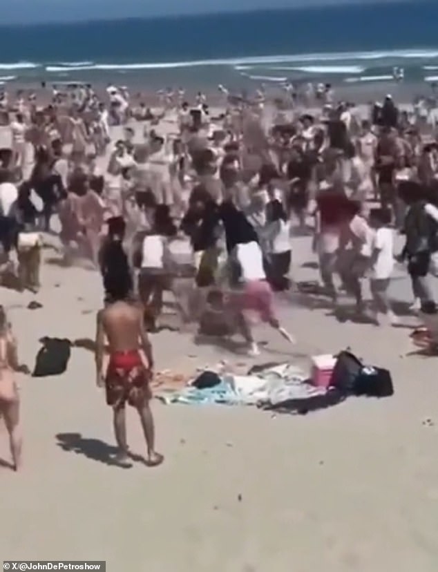 Teen mayhem breaks out on Rhode Island beach with three stabbed and hundreds sent fleeing