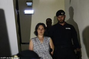 Sexologist mother accused of abandoning boys, five and three, in forest sings opera as stepfather shouts ‘I love you’ in surreal court hearing