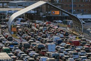 Total gridlock at Dover as half-term holidaymakers queue for more than four HOURS in 30C heat