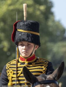 Female soldier who died after she was thrown from her horse moments after performing in front of the King at the Royal Windsor Horse Show ‘was dragged under heavy gun carriage’