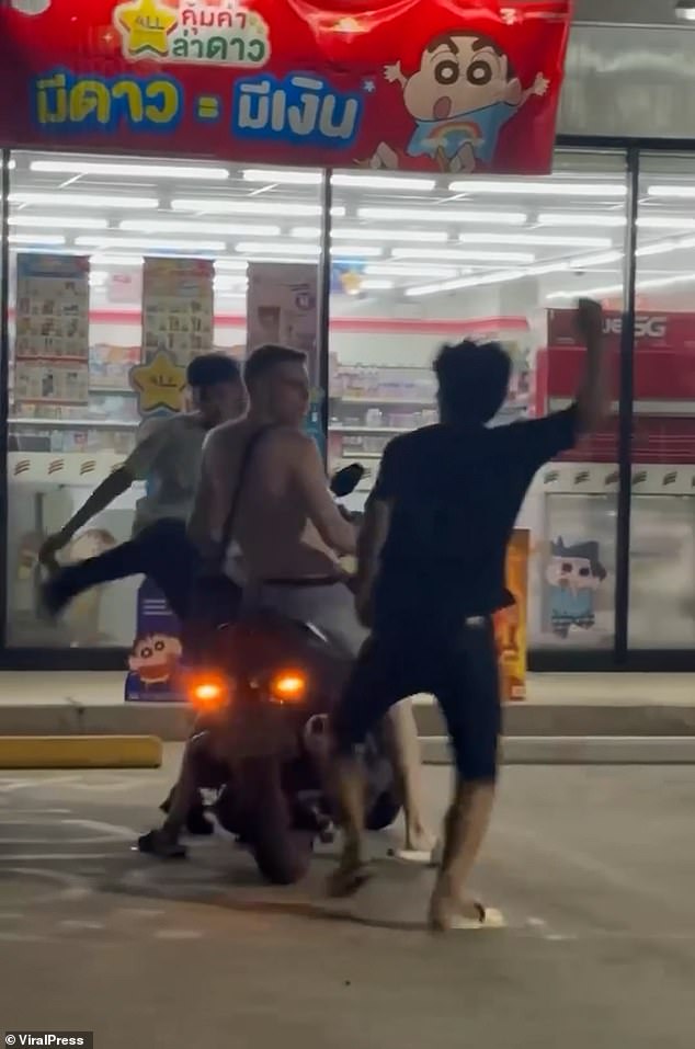 British tourist is attacked by locals after he’s accused of trying to steal a drink from Thai supermarket