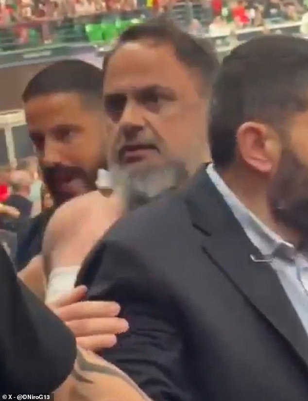 Nottingham Forest owner Evangelos Marinakis left with a RIPPED shirt and bruises on his face after public bust-up with Greek Prime Minister’s nephew