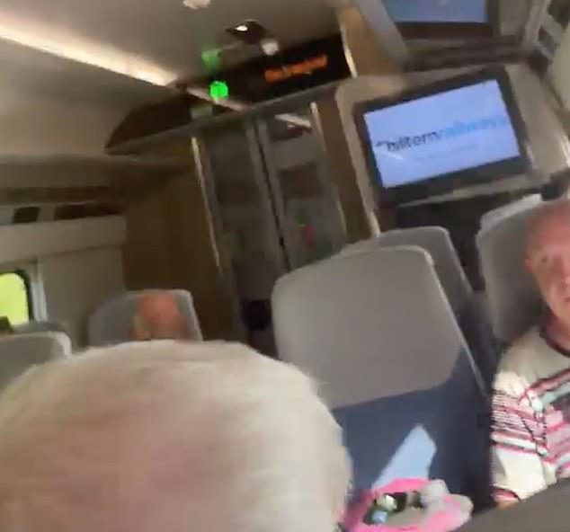 ‘It’s too hot for us to go on’: Commuters kicked off train in scorching heat ‘after air conditioning stops working in carriages’ on record-breaking May day