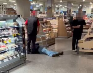 Supermarket giant Coles investigating after elderly customer was allegedly knocked to the ground by staff member when he complained he was overcharged