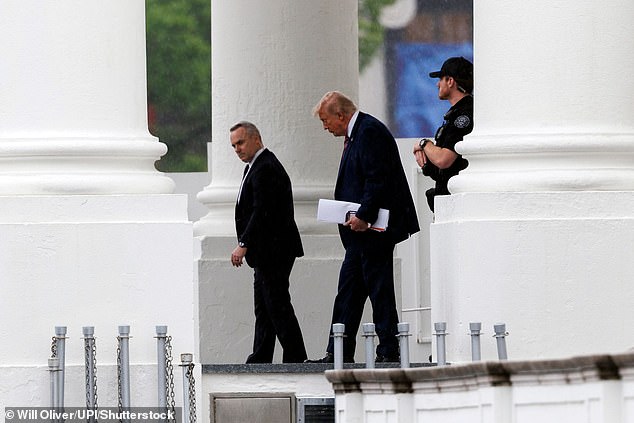 Trump arrives at Walter Reed Hospital for annual physical ahead of his 80th birthday as mysterious bruises raise health worries
