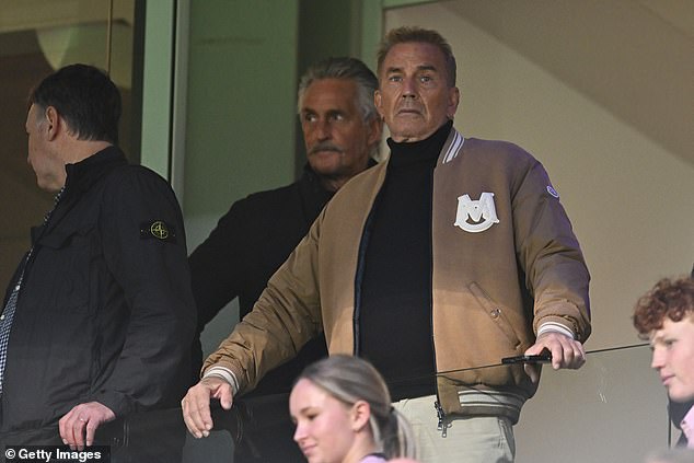 Inside Kevin Costner’s surprise AFL experience as Hollywood star gets ‘obsessed’ with Aussie tradition and takes home a doggy bag of footy food