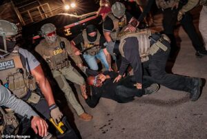 ICE agents ordered to leave after almost being overwhelmed by rabid protesters who bit chunks out of their arms amid violent clash outside NJ detention facility
