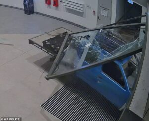 Baldivis: Wild moment thieves steal an ATM after ramming a ute through the doors of a Perth shopping centre
