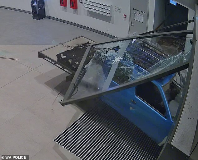 Baldivis: Wild moment thieves steal an ATM after ramming a ute through the doors of a Perth shopping centre