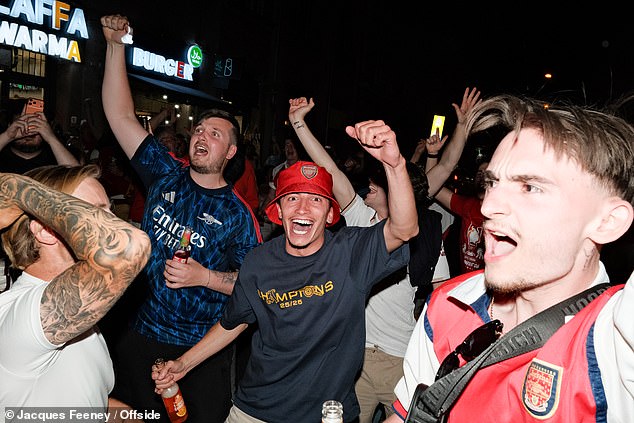 Arsenal fans take over Budapest ahead of tonight’s Champions League final against Paris St Germain as 4,000 police prepare for trouble