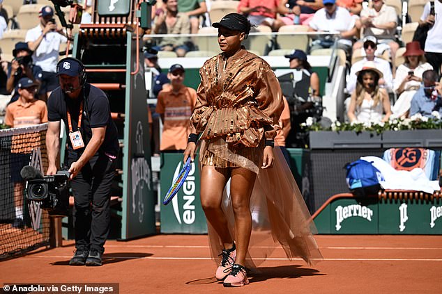 Naomi Osaka arrives for French Open match in billowing dress as she refuses to back down AGAIN on wearing ‘fashion show’ outfits, despite infuriating opponent