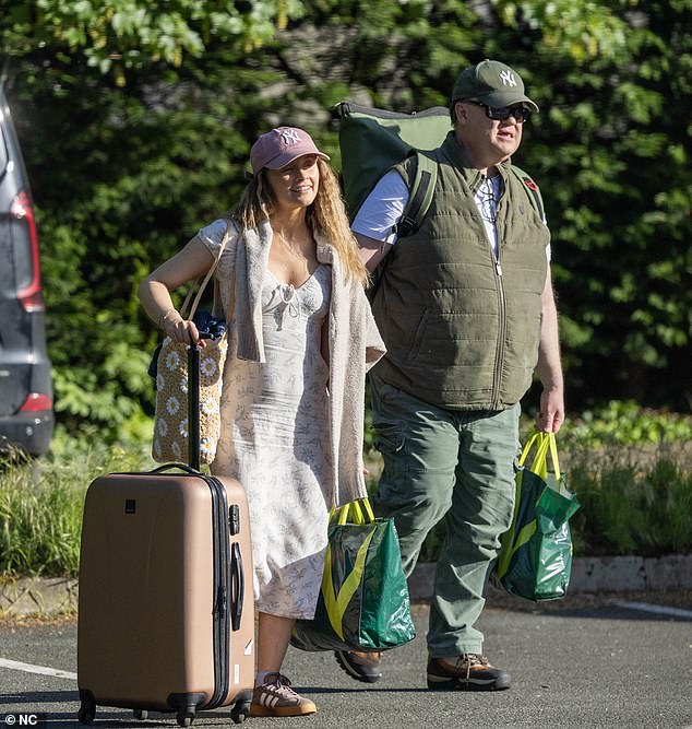 Mr Tumble, 55, arrives at hotel with co-star girlfriend Samantha Dorrance, 34, after the ‘madly in love’ CBeebies icon admitted he was ‘workaholic’ and struggled to find ‘the one’