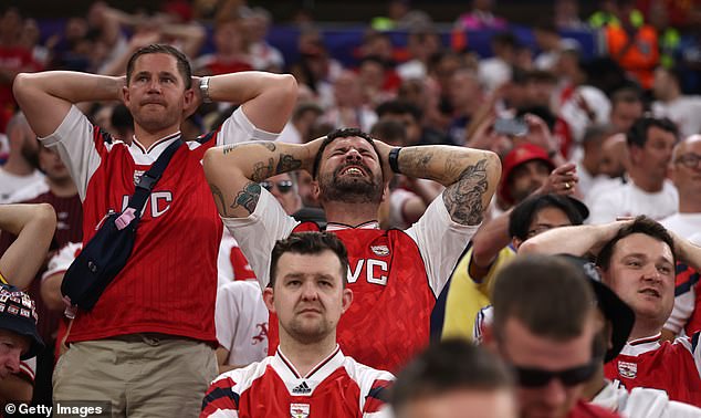 Arsenal fans in despair and players in tears as they lose Champions League final on penalties after their star centre back blazed his kick over the crossbar