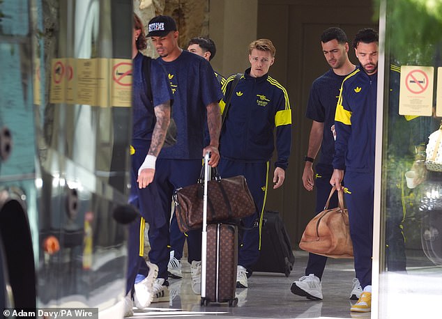 Arsenal’s heartbroken stars leave team hotel in Budapest hours after brutal Champions League final defeat on penalties against PSG