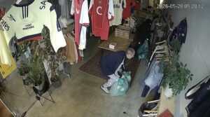 Moment thugs on bikes break into vintage store before stealing £6,200 of designer clothes