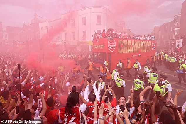 A party 22 years in the making: Arsenal’s Premier League title parade turns north London into sea of red in celebration of heroes – as they banish Champions League heartache