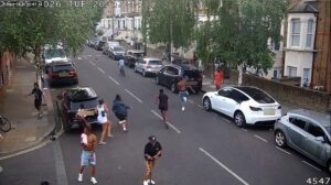 Moment terrified witnesses flee after man, 20, stabbed to death in daylight attack on London street – as two men arrested