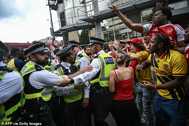 Nine people are arrested at Premier League title parade in north London as chaos erupts following Champions League defeat