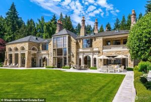 Telecom mogul’s enormous waterfront mansion in crime-ridden Seattle sells for GIGANTIC discount on its original $85m listing price