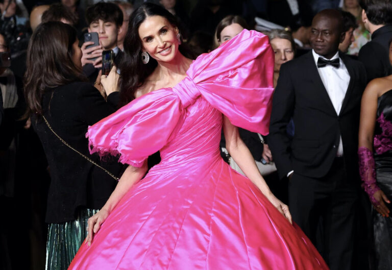 Demi Moore in Pink Silk Matieres Fecales at the “Paper Tiger” Premiere During the 79th Cannes Film Festival