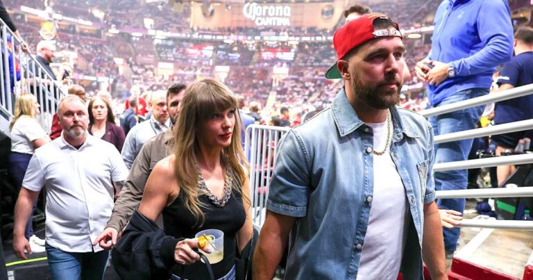 Taylor Swift and Travis Kelce Cheer on Cavaliers Courtside