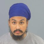 Knife-obsessed Sikh man is jailed for 21 years after murdering student Henry Nowak who was arrested by police for racism as he lay dying