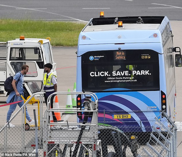 Three Lions on the plane! England’s footballers fly out to Miami for the World Cup with captain Harry Kane leading the way – and Marcus Rashford’s already out there