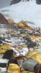 The garbage bin at the top of the world: Mount Everest’s highest campsite is littered with abandoned tents, trash and human waste, video shows