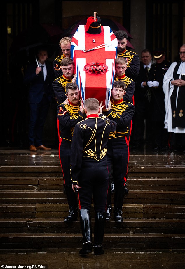 Mourners honour female soldier at funeral after she was thrown from a horse to her death moments after performing in front of the King