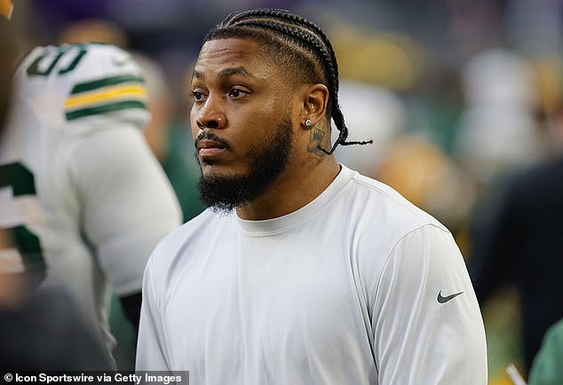 Josh Jacobs returns to Packers practice a week after turning himself in on FIVE domestic violence charges