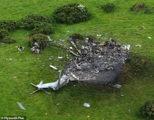 Tributes to female pilot and two other crew members who died when Royal Navy helicopter crashed into Devon field on training exercise