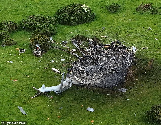 Tributes to female pilot and two other crew members who died when Royal Navy helicopter crashed into Devon field on training exercise