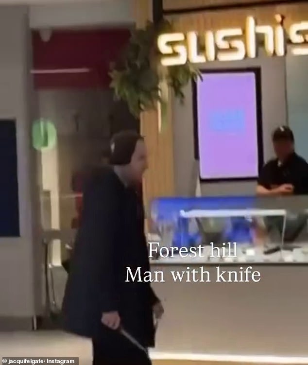 Man holding a large knife forces terrified shoppers to barricade themselves inside stores in Melbourne
