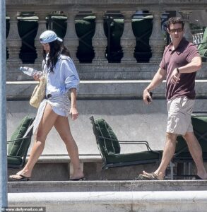 Dua Lipa and Callum Turner kick back on the balcony of their £6,000-a-night hotel in Sicily as they enjoy a moment of peace before £1million wedding weekend gets underway