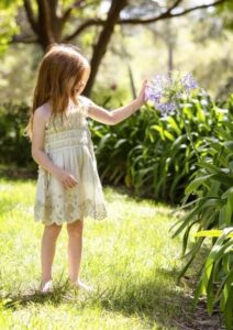 VANESSA TAIT: Why this picture of sweet ‘hippy child’ Lilibet with her bare feet and hair flowing free makes my heart break for George, Charlotte and Louis. Maybe Meghan got it right after all…