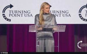 Erika Kirk interrupted at Turning Point by heckler shouting vile slur… before Charlie’s widow hits back with response that sparks a standing ovation