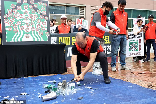 Starbucks marketing stunt backfires as South Koreans destroy tumblers and boycott chain after it launches promotion on anniversary of historical massacre