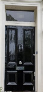 Paint it black! Rolling Stones icon Ronnie Wood is ordered to replace bright pink door on his £7million west London mansion by jobsworth council