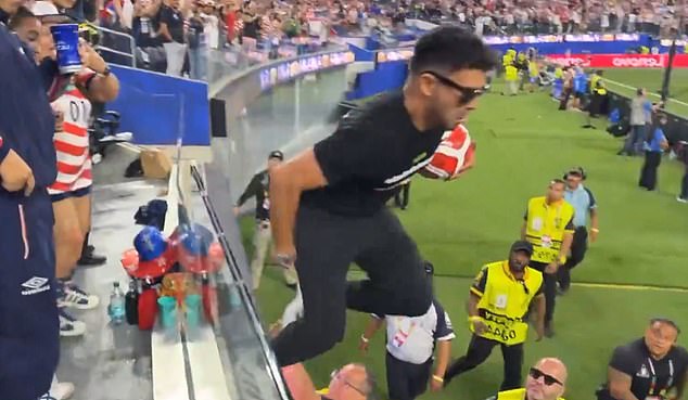 Wild moment pitch invader tries to get on the field at USA’s World Cup opener… only to be slammed by security