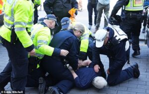 Anti-immigration activists clash with counter-protesters at Brighton ‘Carnival Against Fascism’ as horrified parents with young children are caught up in the violence