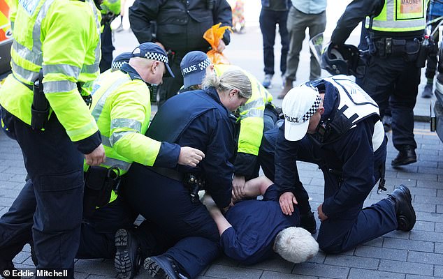 Anti-immigration activists clash with counter-protesters at Brighton ‘Carnival Against Fascism’ as horrified parents with young children are caught up in the violence