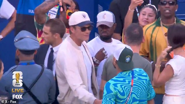 Tom Brady rubs shoulders with Neymar as he headlines stars at World Cup game… before performing sweet handshake with daughter Vivian