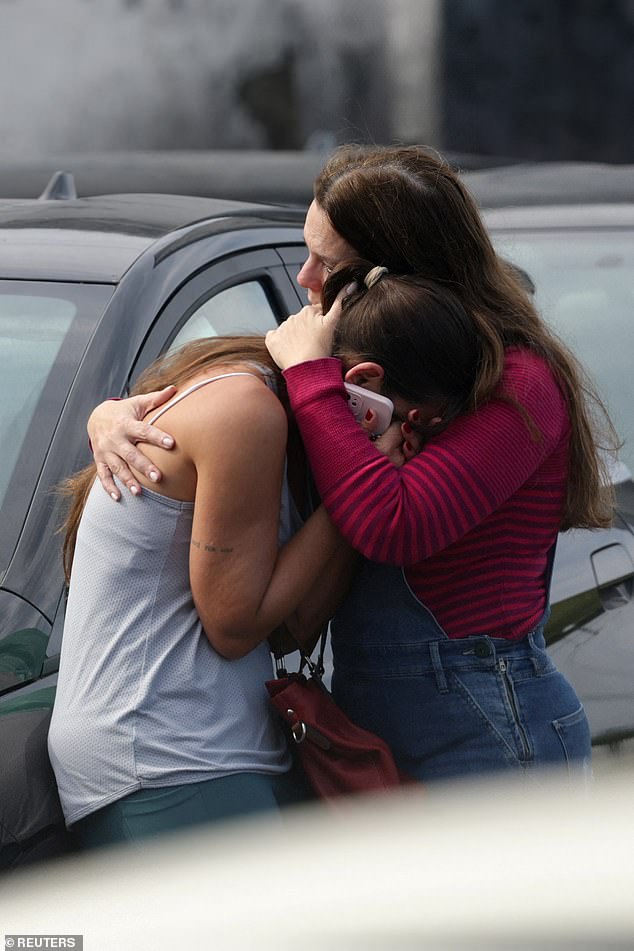 Six people are dead after two helicopters collided in Brazil and crashed into the parking lot of an electric car dealership