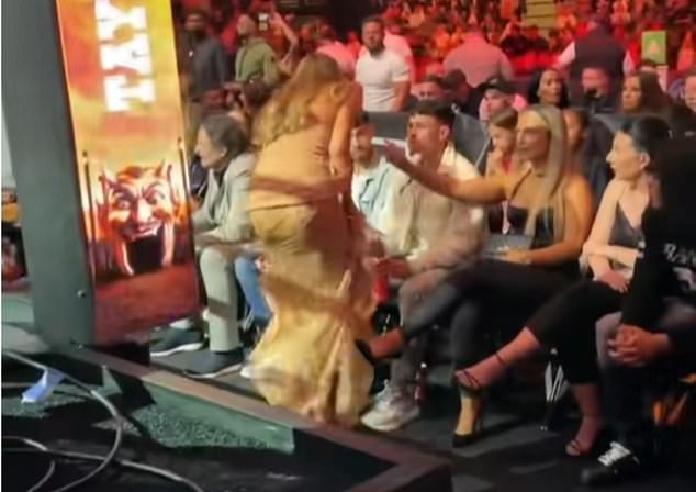 Phil Foden’s partner Rebecca Cooke steps in to stop OnlyFans influencer Lily Phillips approaching her Man City footballer boyfriend at a boxing fight